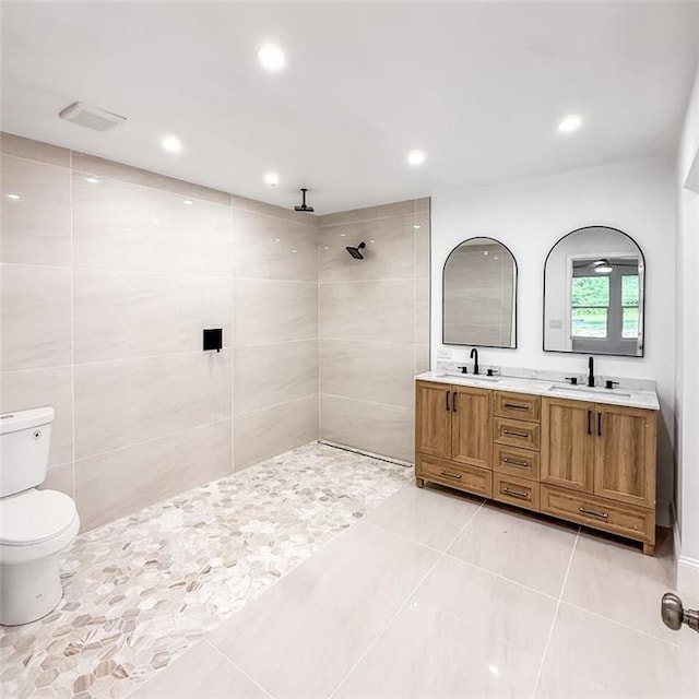 7498 Pinehill Rd, Daphne, AL 36526 - bathroom with tile patterned flooring, double vanity, walk in shower, and recessed lighting