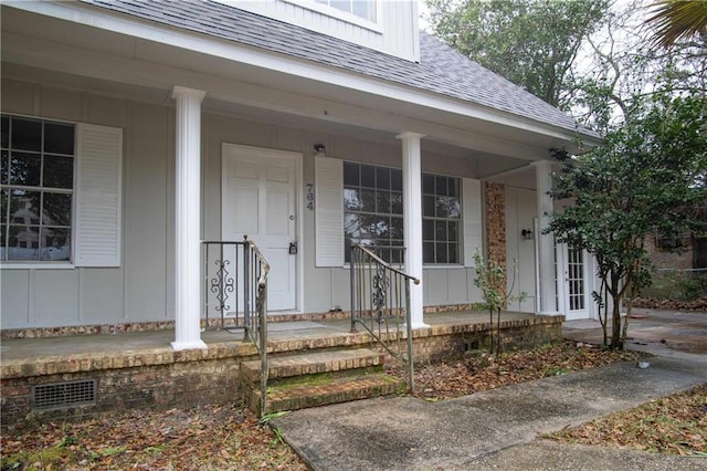 doorway to property with covered porch