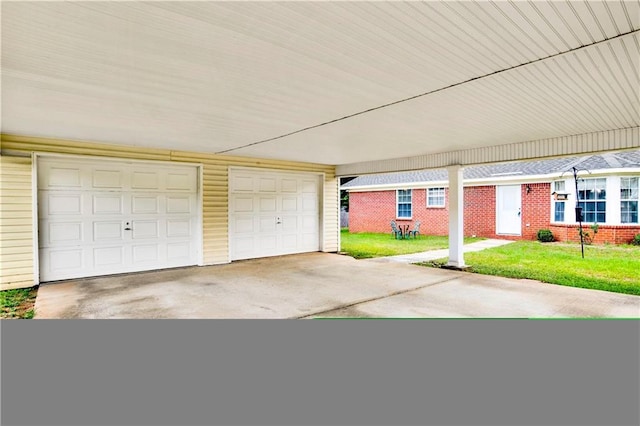 10437 Traci Dr, Semmes, AL 36575 - garage with driveway and a carport