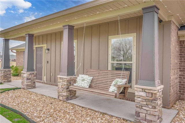 doorway to property featuring covered porch