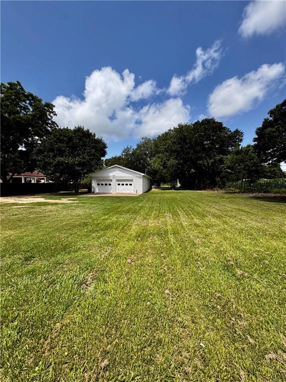 17080A Wayne Johnson Ln, Fairhope, AL 36532 - view of green lawn with a garage