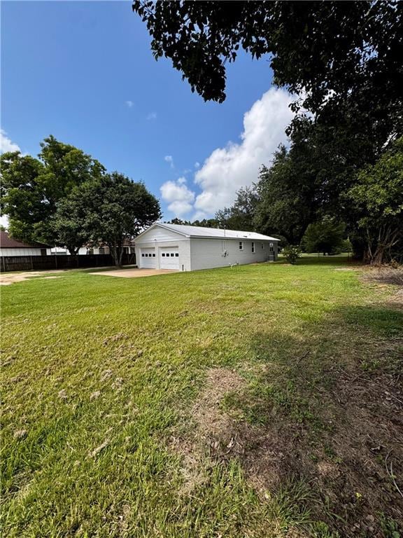 17080A Wayne Johnson Ln, Fairhope, AL 36532 - view of green lawn with a garage