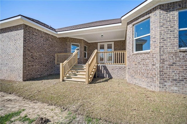 view of exterior entry featuring french doors