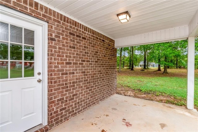 view of patio / terrace featuring a carport