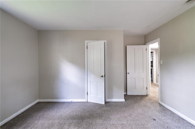 unfurnished bedroom featuring carpet floors