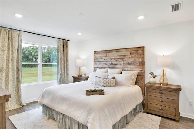 bedroom featuring light hardwood / wood-style floors