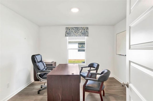 office with dark hardwood / wood-style floors