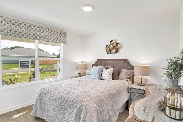 bedroom featuring hardwood / wood-style flooring