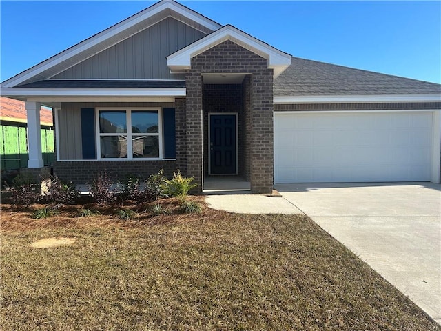 view of front of home with concrete driveway, board and batten siding, roof with shingles, brick siding, and a garage