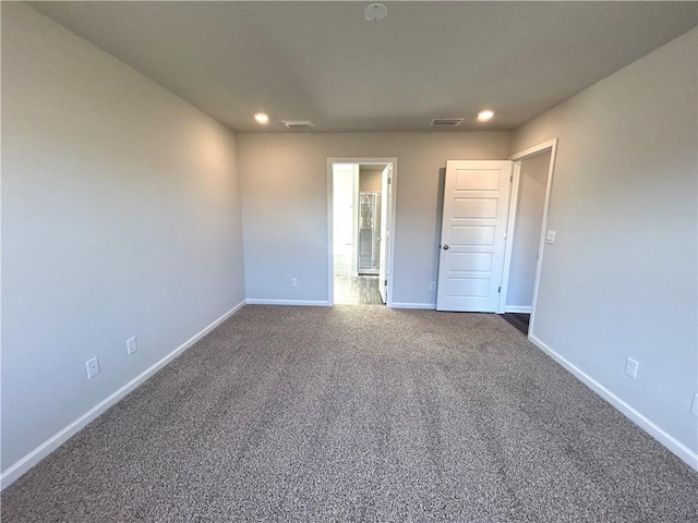 unfurnished bedroom with carpet