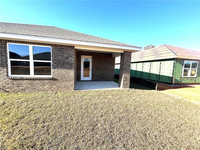 back of property with a patio area