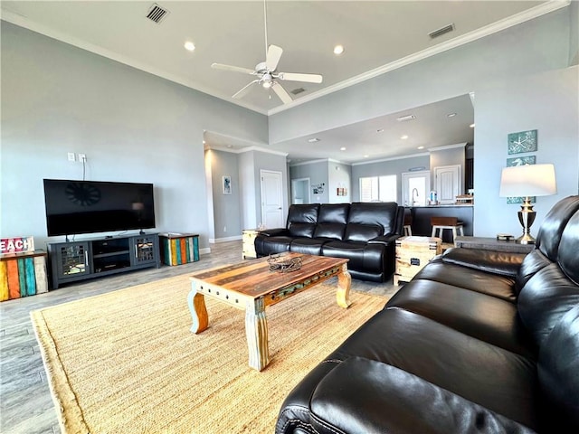 living room featuring visible vents, recessed lighting, ceiling fan, and wood finished floors