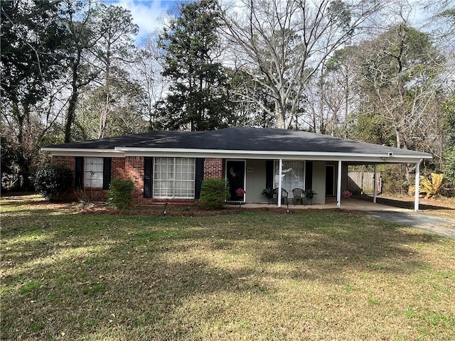 single story home with a carport and a front yard