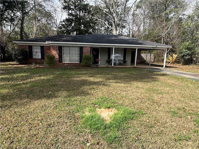 ranch-style home with a carport and a front lawn