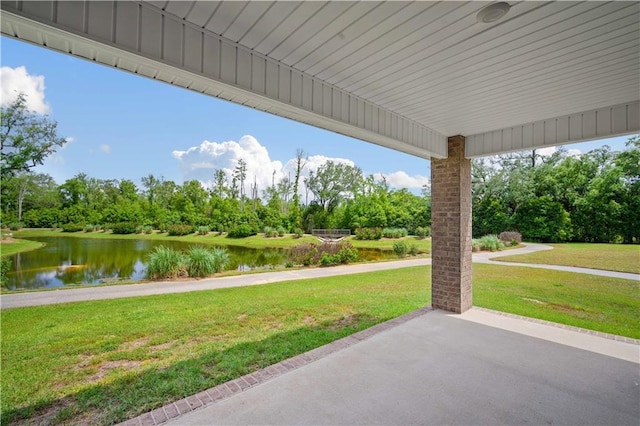 view of patio / terrace with a water view