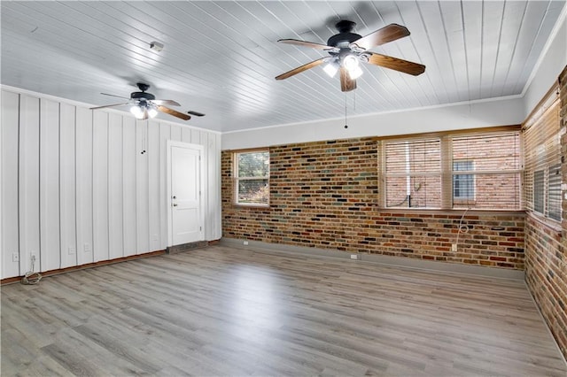 1215 Anchor Dr, Mobile, AL 36693 - unfurnished living room with brick wall, ceiling fan, wooden ceiling, wood finished floors, and baseboards