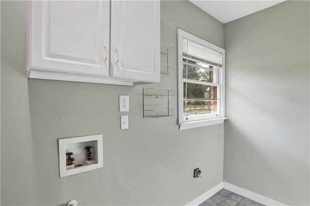 1215 Anchor Dr, Mobile, AL 36693 - washroom featuring cabinet space, hookup for a washing machine, and baseboards