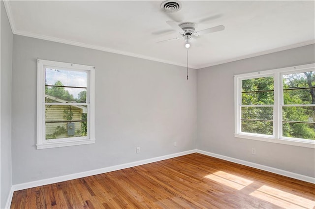 1215 Anchor Dr, Mobile, AL 36693 - unfurnished room with plenty of natural light, baseboards, wood finished floors, and ornamental molding