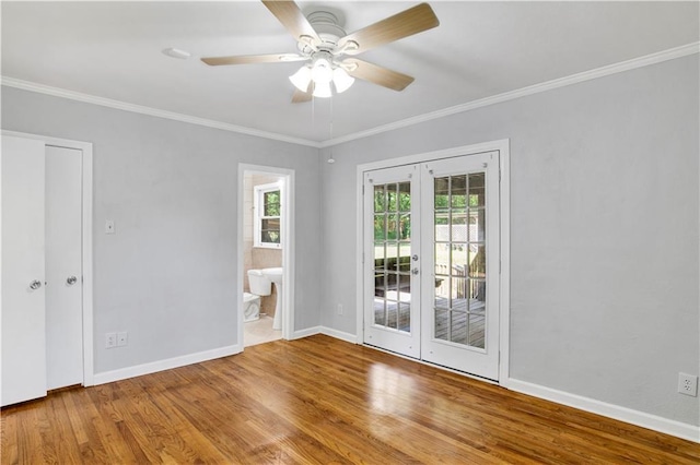 1215 Anchor Dr, Mobile, AL 36693 - unfurnished room with french doors, baseboards, wood finished floors, ornamental molding, and a ceiling fan