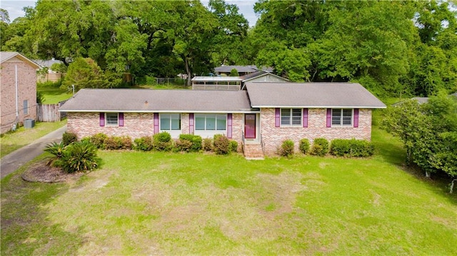 1215 Anchor Dr, Mobile, AL 36693 - view of front facade featuring brick siding and cooling unit