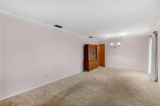 empty room with ornamental molding and light carpet