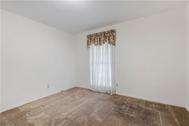 view of carpeted spare room