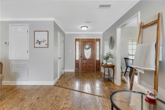 entrance foyer featuring wood-type flooring and crown molding