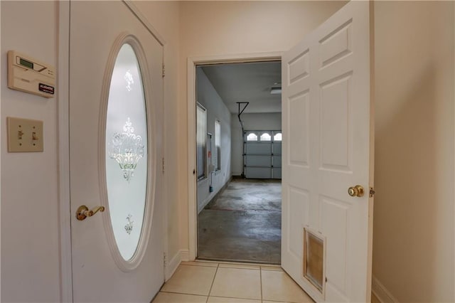 foyer entrance featuring light tile patterned floors