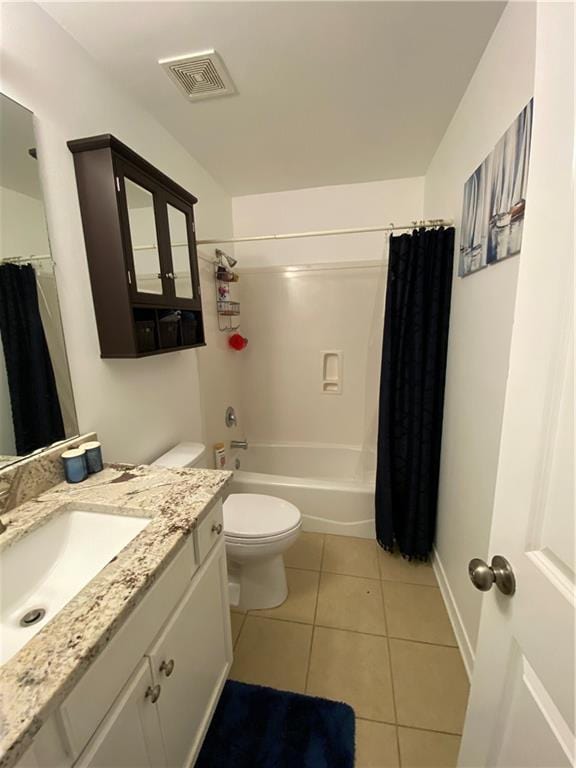 bathroom with toilet, shower / tub combo, tile patterned floors, visible vents, and vanity