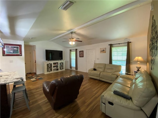 living room featuring ceiling fan, visible vents, vaulted ceiling with beams, and wood finished floors