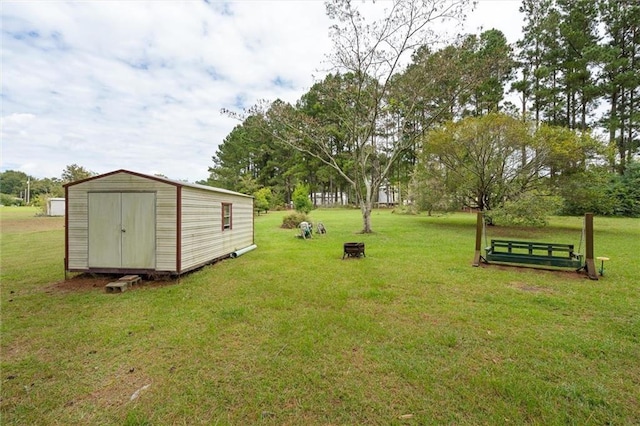 23700 Cumberland Rd, Robertsdale, AL 36567 - view of yard with an outbuilding and a storage unit