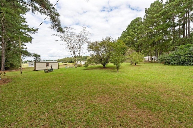 23700 Cumberland Rd, Robertsdale, AL 36567 - view of yard with an outbuilding