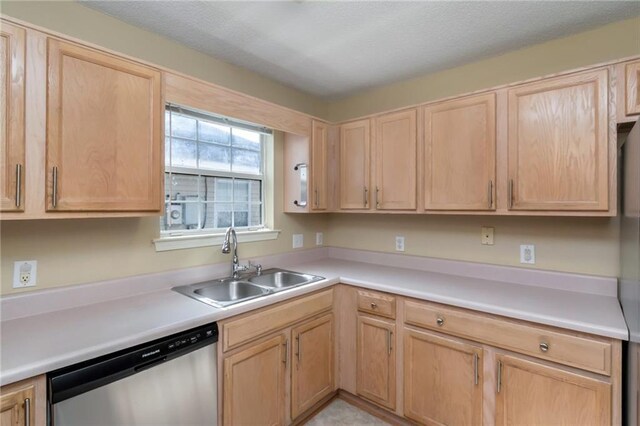8522 Brandy Oak Ct, Mobile, AL 36695 - kitchen featuring stainless steel dishwasher, a sink, light countertops, and light brown cabinets