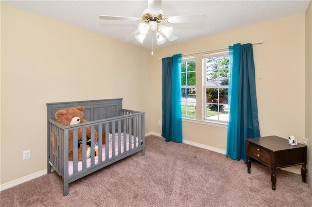 8522 Brandy Oak Ct, Mobile, AL 36695 - bedroom featuring carpet flooring, multiple windows, baseboards, and a ceiling fan