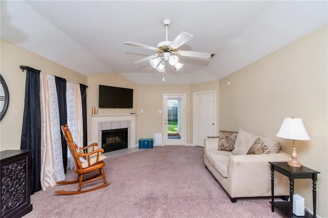 8522 Brandy Oak Ct, Mobile, AL 36695 - carpeted living room with ceiling fan, a tile fireplace, baseboards, and lofted ceiling