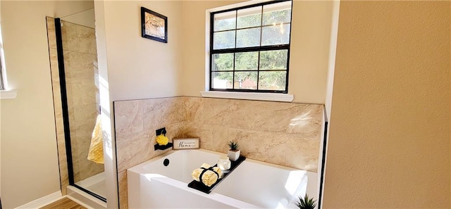 7041 Tierra W, Eight Mile, AL 36613 - bathroom featuring a garden tub and a shower with door