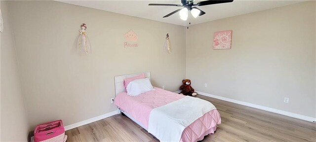 bedroom featuring ceiling fan and hardwood / wood-style floors