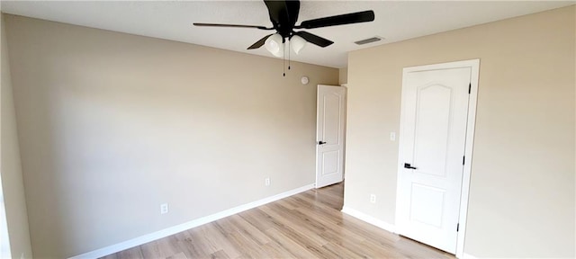 unfurnished bedroom featuring light wood-type flooring and ceiling fan