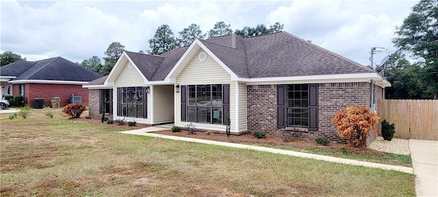 7041 Tierra W, Eight Mile, AL 36613 - view of front facade featuring brick siding and a shingled roof