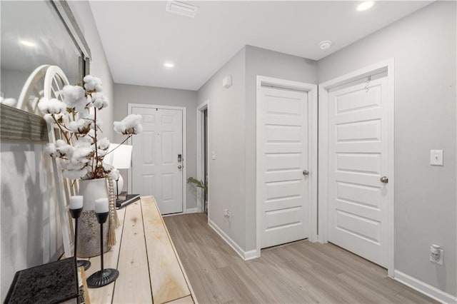 hall featuring light wood-type flooring