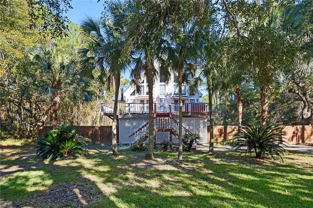 view of yard featuring a wooden deck