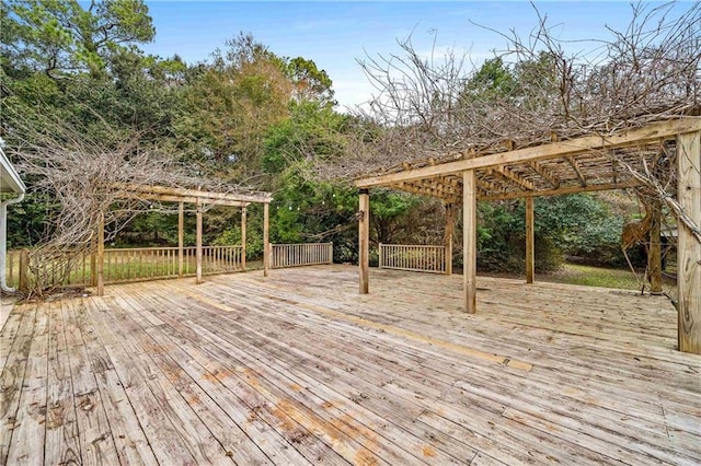 wooden terrace with a pergola