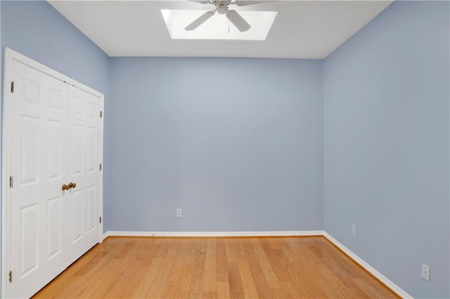 empty room featuring light hardwood / wood-style floors and ceiling fan