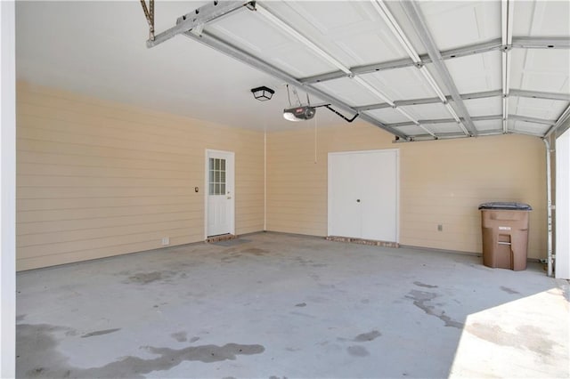 garage featuring a garage door opener