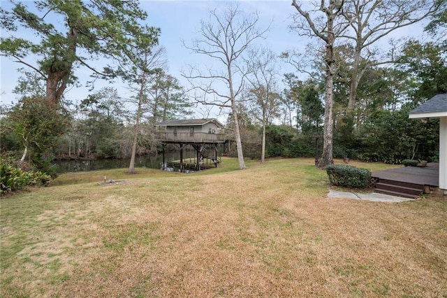 view of yard with a wooden deck