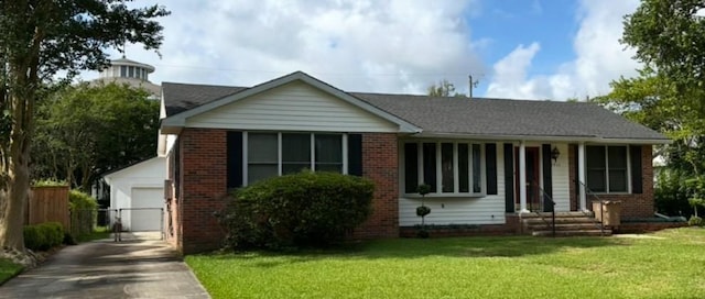 2911 Thornhill Dr, Mobile, AL 36606 - view of front of property with a garage, driveway, brick siding, and an outdoor structure