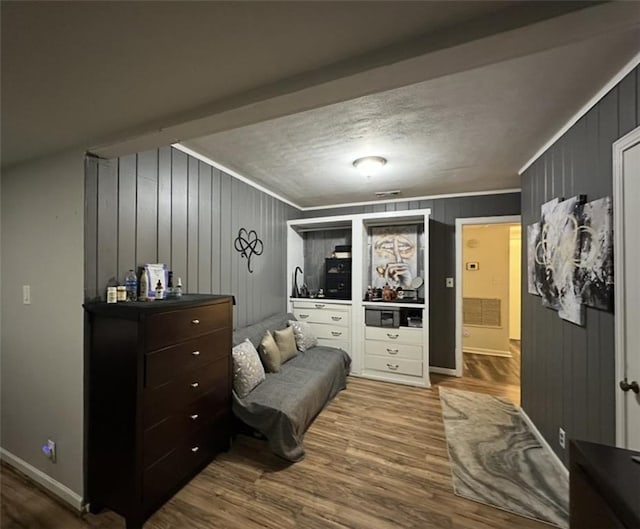 2911 Thornhill Dr, Mobile, AL 36606 - bedroom with wood finished floors and crown molding