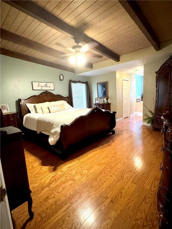 14522 St Stephens Ave, Chatom, AL 36518 - bedroom featuring wooden ceiling, a ceiling fan, wood finished floors, and beamed ceiling