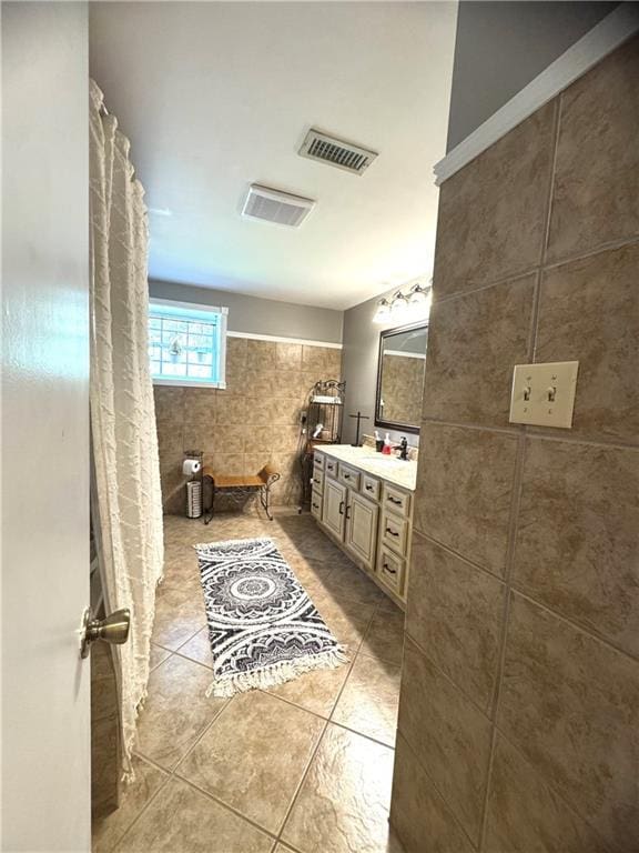 14522 St Stephens Ave, Chatom, AL 36518 - full bathroom with curtained shower, visible vents, tile patterned flooring, and vanity