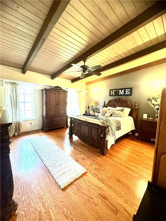 14522 St Stephens Ave, Chatom, AL 36518 - bedroom featuring wood ceiling, beam ceiling, and multiple windows